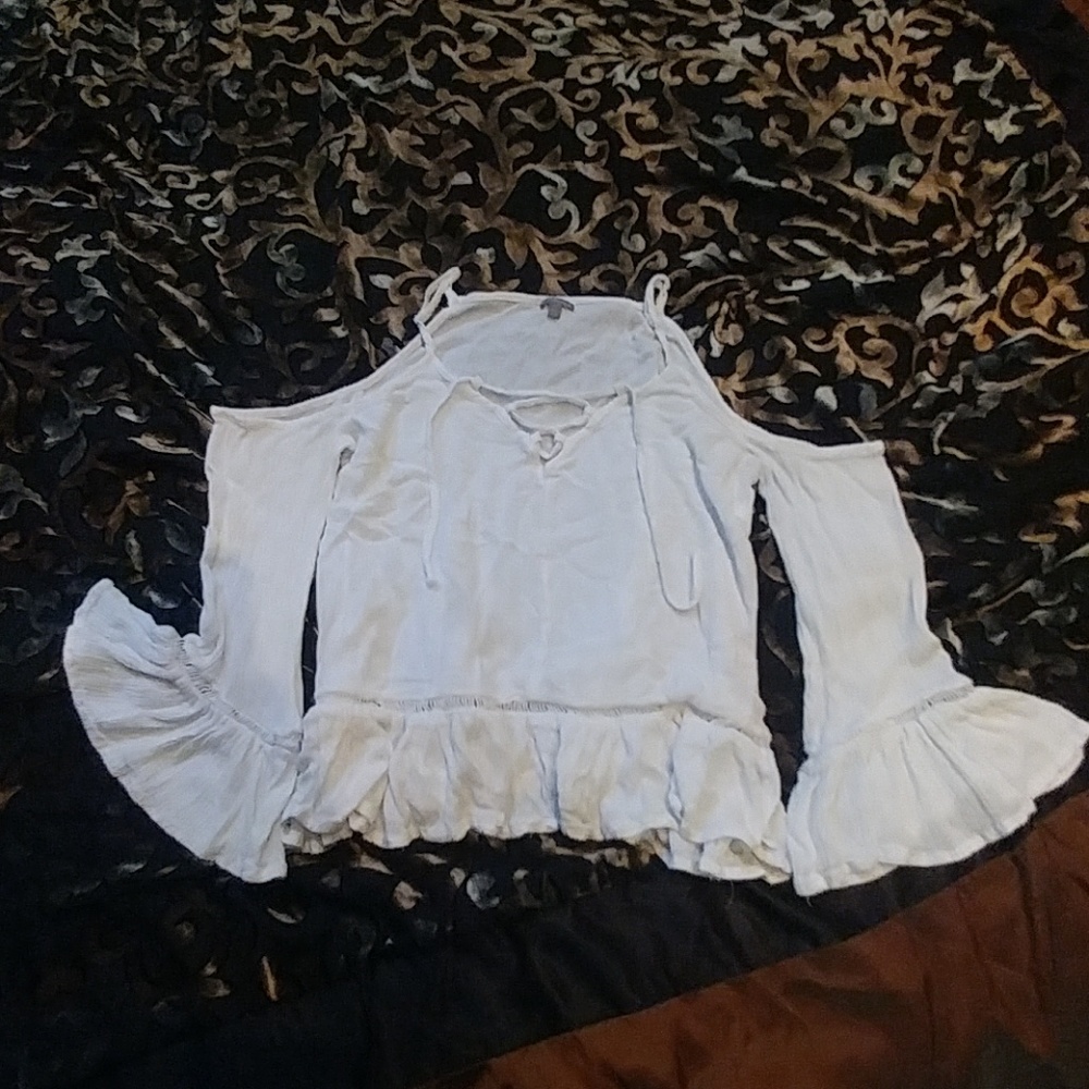 Peekaboo shoulder, white linen blouse